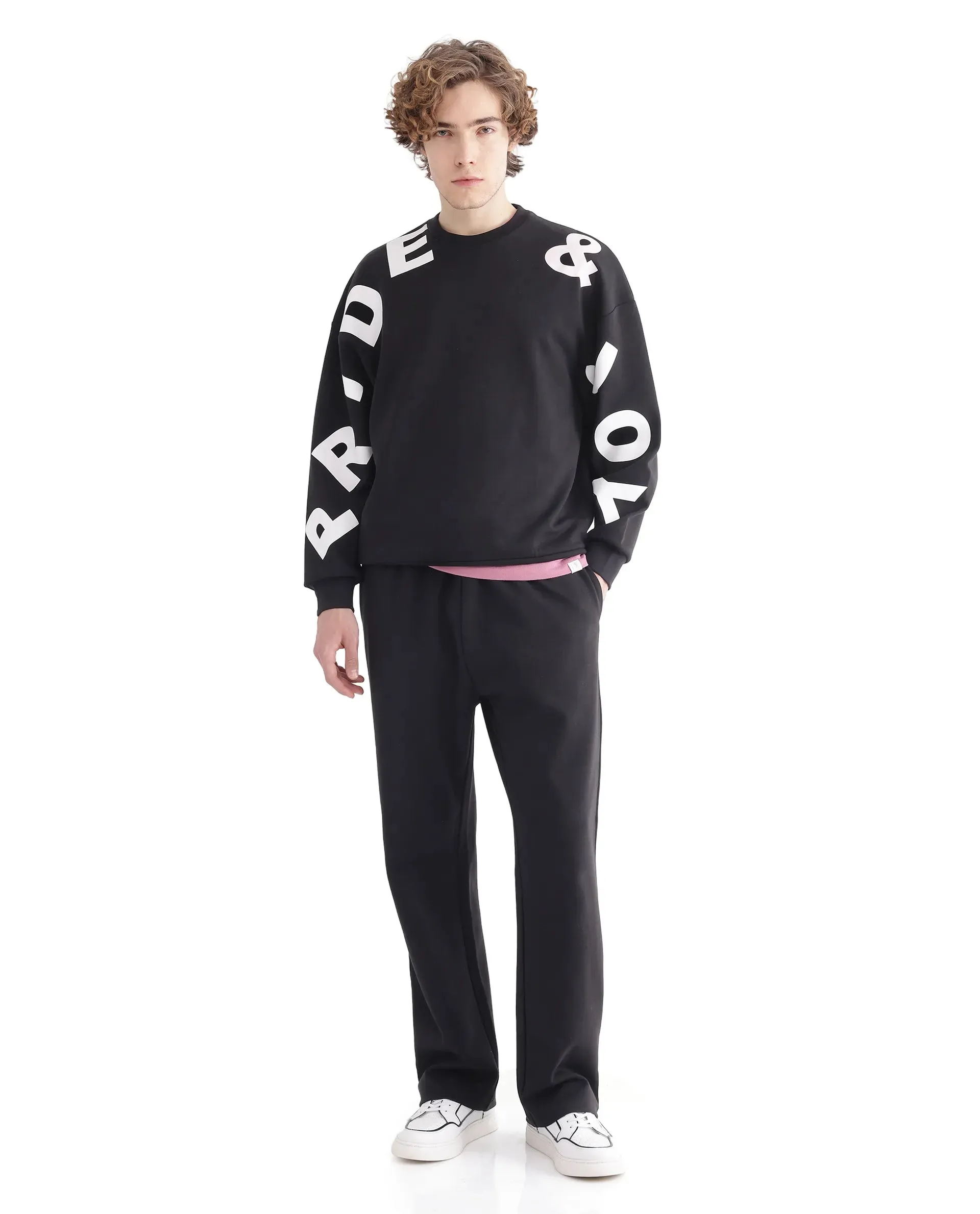 Rare Rabbit Men Ricot-B Black Cotton Blend Fabric Mid Rise Drawstring Closure Printed Track Pant